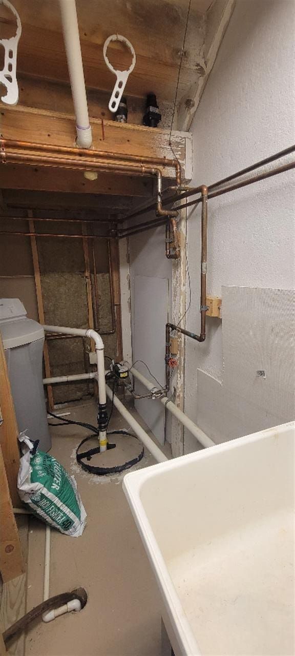 utility room featuring a sink