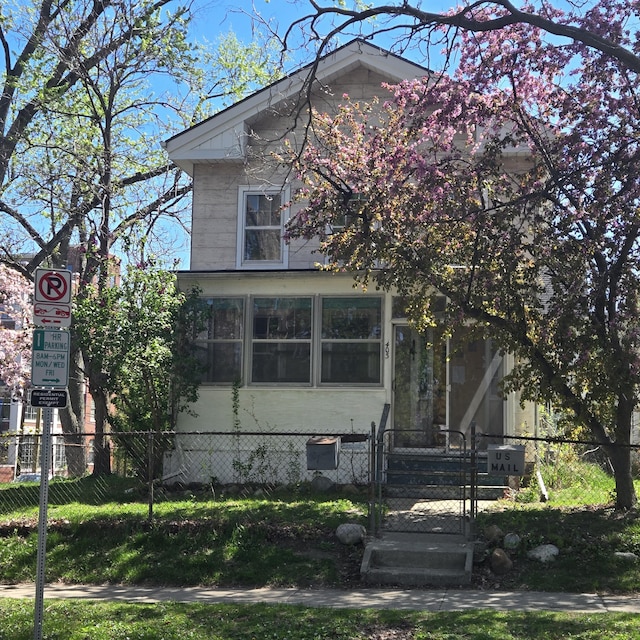 view of front of home with a gate and a fenced front yard