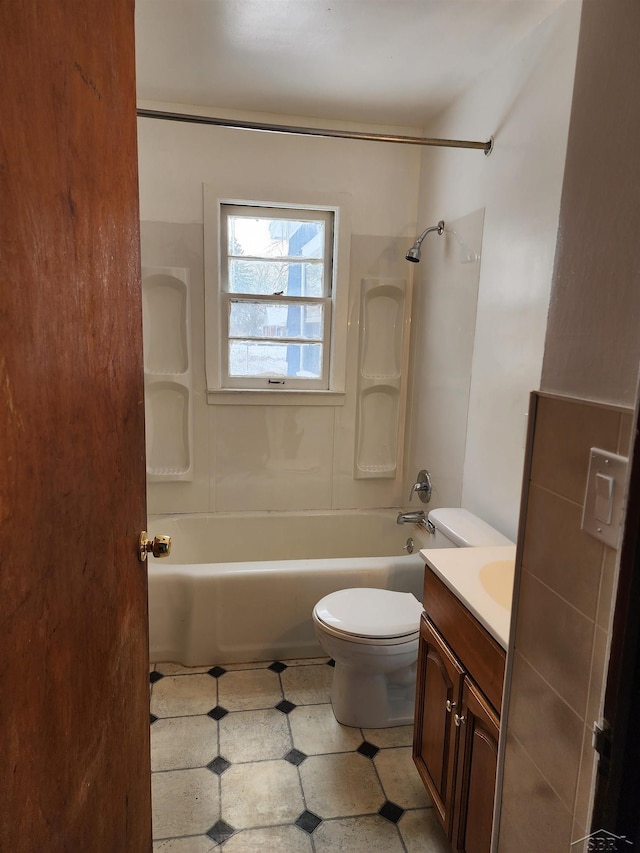 full bathroom with vanity, shower / bathing tub combination, and toilet