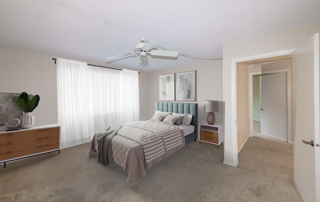 bedroom with ceiling fan and light colored carpet