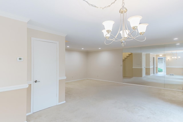 empty room featuring recessed lighting, crown molding, a chandelier, and carpet floors