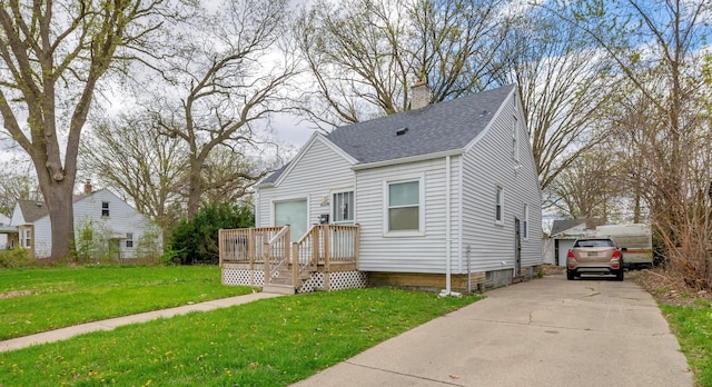 19631 Dwyer St, Detroit, MI 48234 - view of front of home featuring a wooden deck, a shingled roof, a chimney, and a front lawn