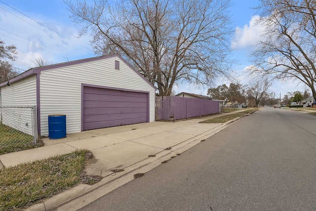 detached garage with fence