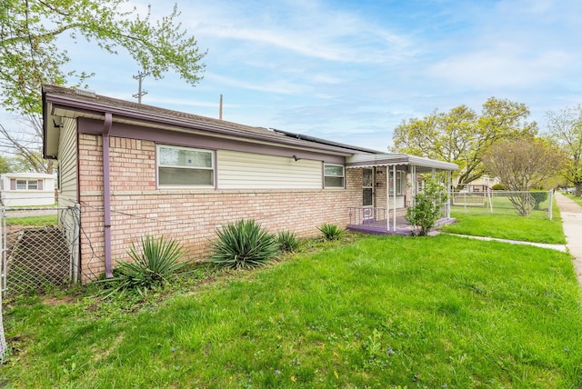 view of front of home with brick siding and solar panels