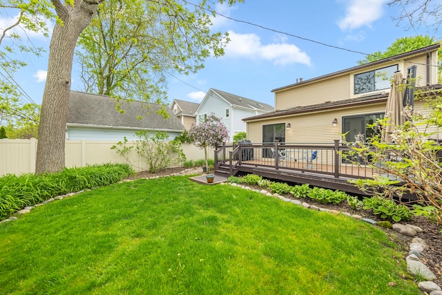 view of yard featuring a wooden deck