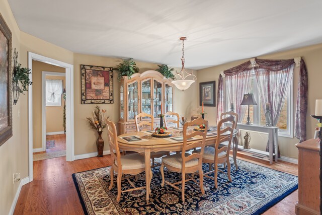 53345 Williams Way, Shelby Twp, MI 48316 - dining area with baseboards and light wood-type flooring