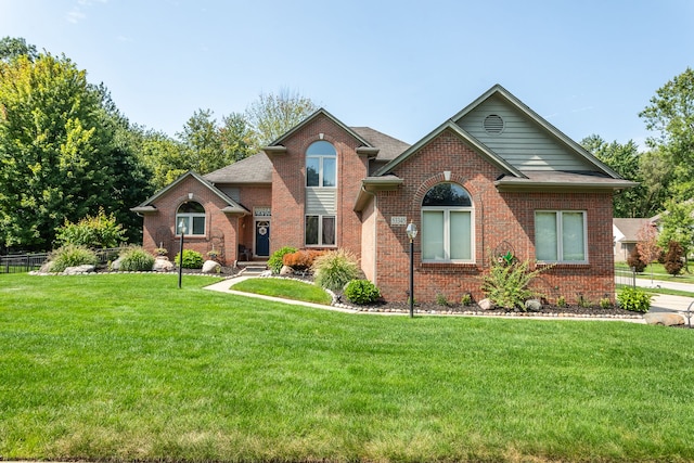 53345 Williams Way, Shelby Twp, MI 48316 - traditional home with brick siding and a front lawn