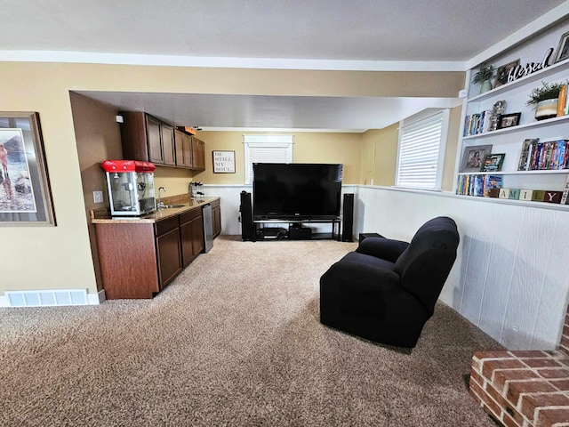 living room with light colored carpet and visible vents