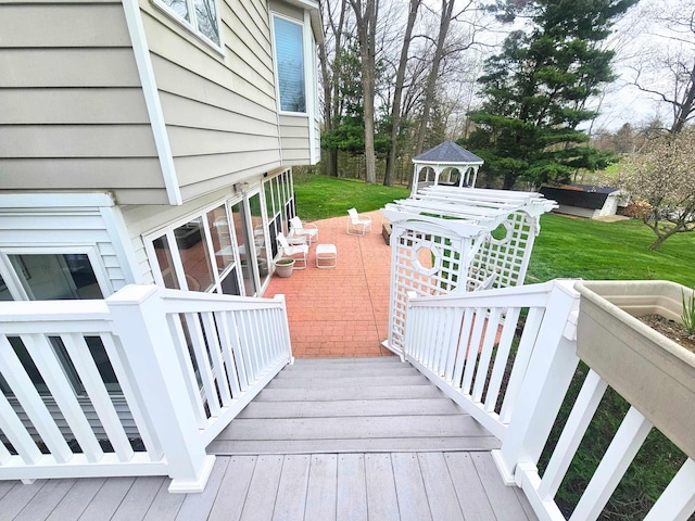 deck featuring a lawn