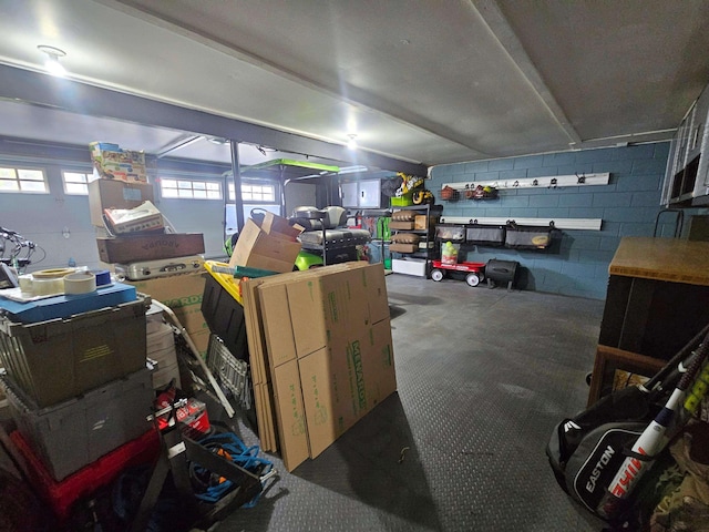 garage featuring concrete block wall