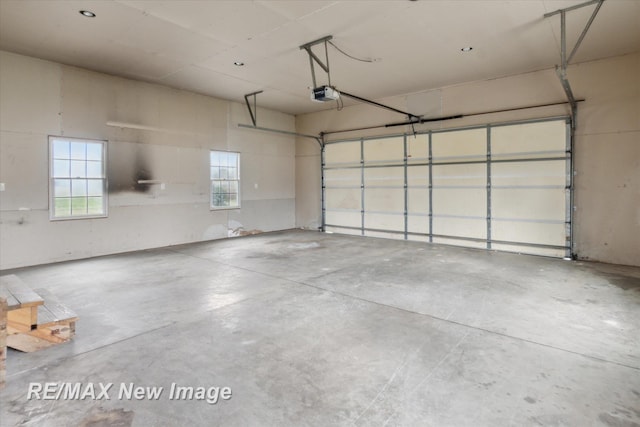 garage featuring a garage door opener