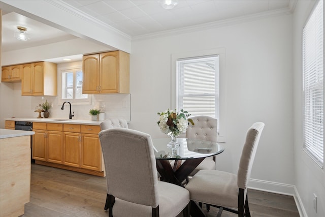 224 N Hewitt Rd, Ypsilanti, MI 48197 - dining area featuring wood finished floors, crown molding, and baseboards