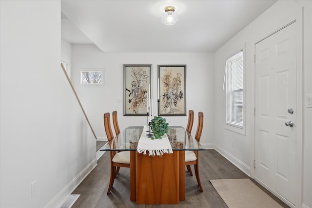 224 N Hewitt Rd, Ypsilanti, MI 48197 - dining room with dark wood-type flooring and baseboards