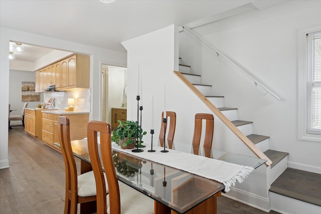 224 N Hewitt Rd, Ypsilanti, MI 48197 - dining room with stairway, dark wood-style flooring, and baseboards