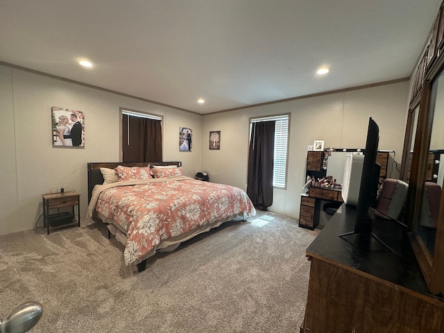 carpeted bedroom featuring crown molding and recessed lighting