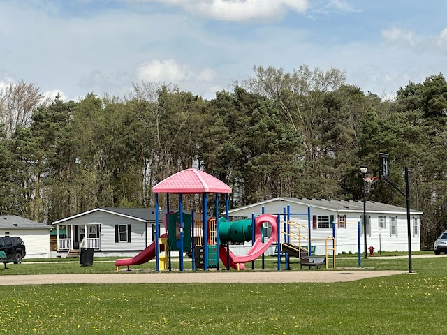 view of jungle gym with a yard