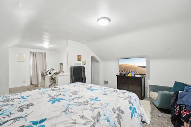 14141 Edmore Dr, Detroit, MI 48205 - bedroom featuring light carpet, lofted ceiling, and visible vents