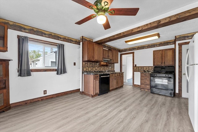 7960 Jackson St, Taylor, MI 48180 - kitchen featuring light wood-style flooring, baseboards, black appliances, and backsplash
