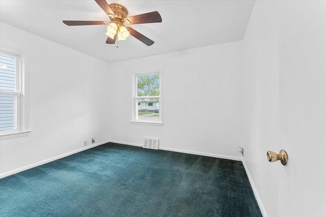 7960 Jackson St, Taylor, MI 48180 - unfurnished room with ceiling fan, dark colored carpet, baseboards, and visible vents