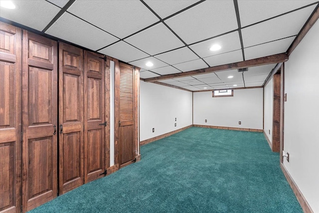 7960 Jackson St, Taylor, MI 48180 - finished below grade area with a paneled ceiling, recessed lighting, baseboards, and dark carpet