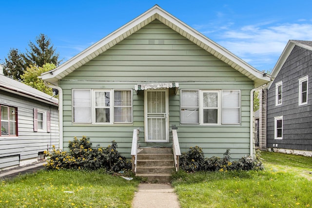 bungalow featuring entry steps