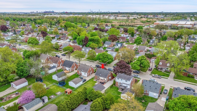 birds eye view of property with a residential view