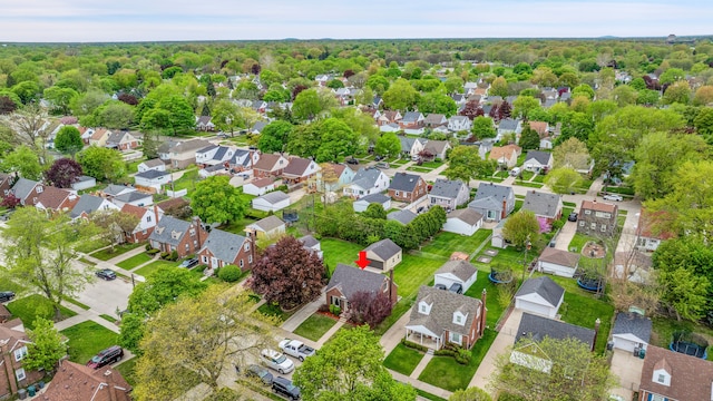birds eye view of property with a residential view