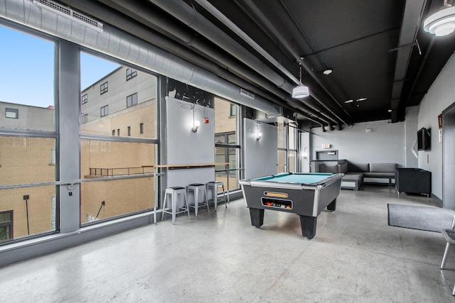 playroom featuring concrete flooring, pool table, and visible vents