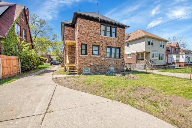 16560 Ashton Ave, Detroit, MI 48219 - rear view of property featuring brick siding and a residential view