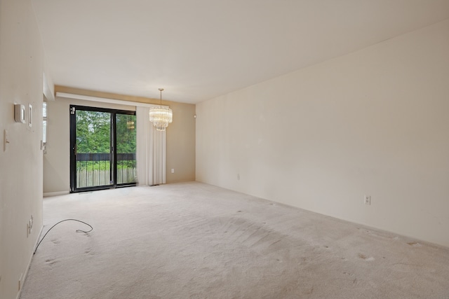 25030 Sherwood Cir, Southfield, MI 48075 - carpeted spare room with a notable chandelier
