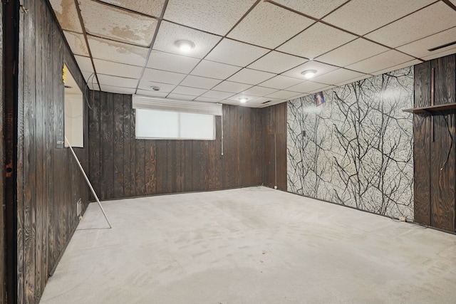 25030 Sherwood Cir, Southfield, MI 48075 - basement with wooden walls and a drop ceiling