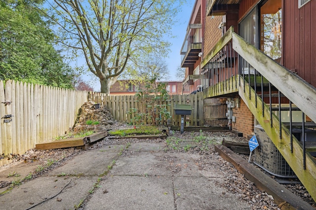 25030 Sherwood Cir, Southfield, MI 48075 - view of patio featuring fence and stairway