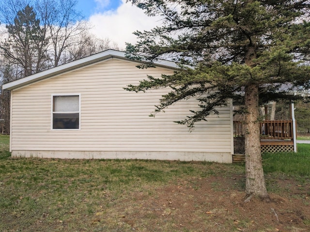 view of home's exterior with a deck