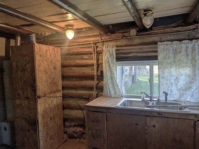 below grade area with a sink