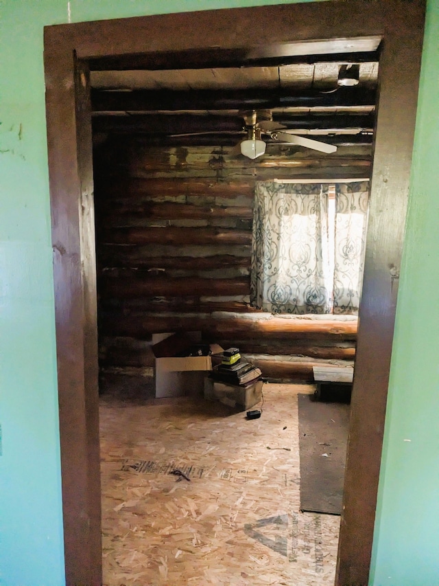 hallway featuring log walls