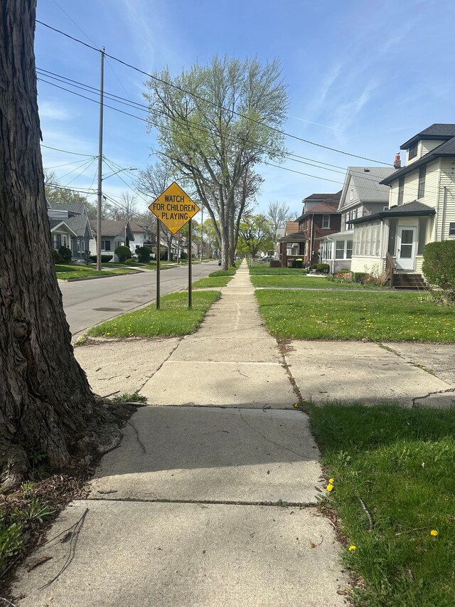 20 Thorpe St, Pontiac, MI 48341 - view of road featuring traffic signs, street lighting, and sidewalks