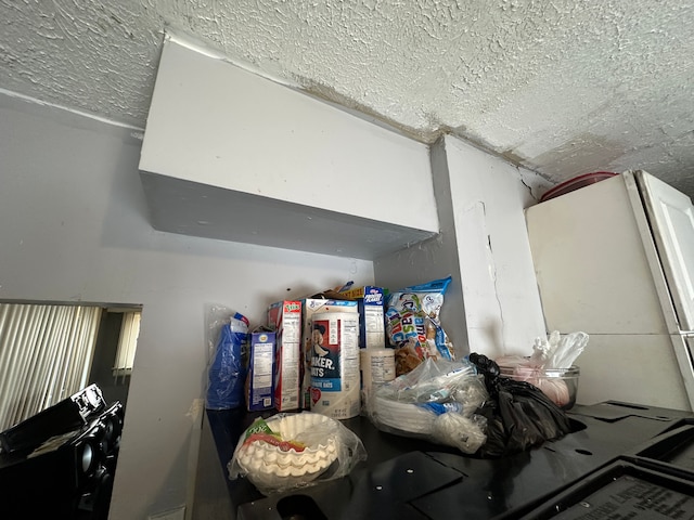 details featuring a textured ceiling