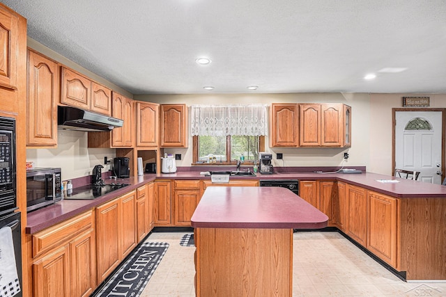 11965 Speaker Rd, Yale, MI 48097 - kitchen featuring a peninsula, light floors, black electric stovetop, stainless steel microwave, and under cabinet range hood