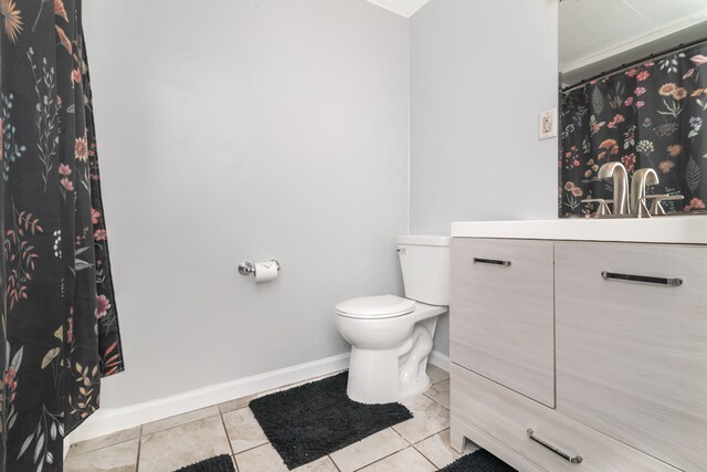 full bath with a shower with curtain, toilet, baseboards, tile patterned flooring, and vanity