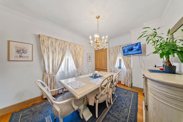 725 W Boston Blvd, Detroit, MI 48202 - dining area with crown molding, light wood finished floors, and a notable chandelier