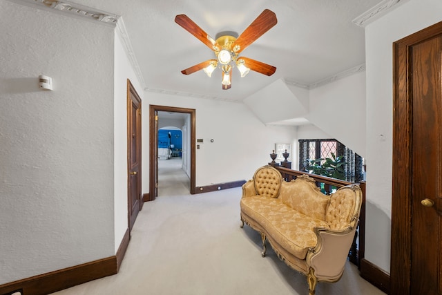 725 W Boston Blvd, Detroit, MI 48202 - living area featuring crown molding, a ceiling fan, baseboards, and light carpet