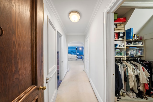 725 W Boston Blvd, Detroit, MI 48202 - hall with crown molding, arched walkways, baseboards, and light carpet