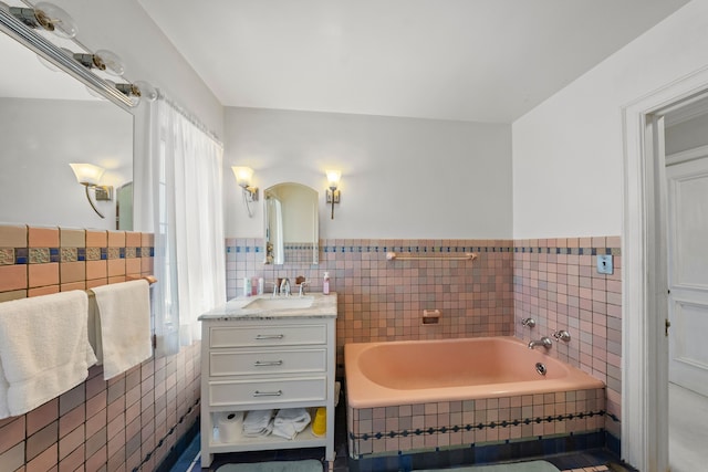 725 W Boston Blvd, Detroit, MI 48202 - full bath with vanity, tile walls, wainscoting, and a bath