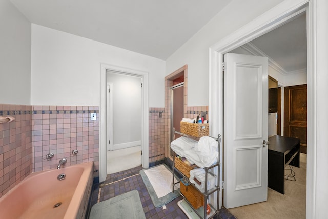 725 W Boston Blvd, Detroit, MI 48202 - full bathroom featuring tile walls, a wainscoted wall, and a garden tub