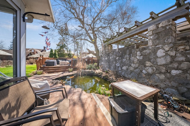 725 W Boston Blvd, Detroit, MI 48202 - view of patio with a garden pond and fence