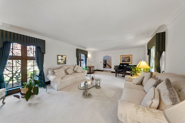 725 W Boston Blvd, Detroit, MI 48202 - living room featuring carpet flooring, arched walkways, crown molding, and baseboards