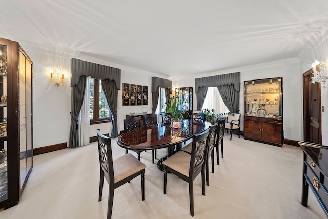 725 W Boston Blvd, Detroit, MI 48202 - dining room with crown molding, light colored carpet, and a wealth of natural light