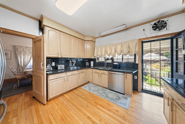 725 W Boston Blvd, Detroit, MI 48202 - kitchen with crown molding, tasteful backsplash, stainless steel dishwasher, a sink, and light wood-style floors
