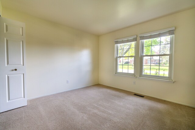 6228 Atkins Dr, Troy, MI 48085 - carpeted empty room with baseboards