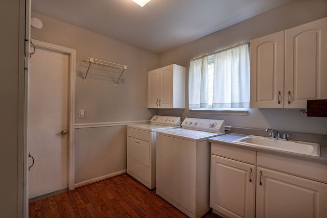 6228 Atkins Dr, Troy, MI 48085 - laundry area featuring washing machine and clothes dryer, wood finished floors, cabinet space, and baseboards